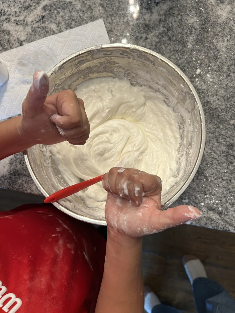 diy squishy recipe child mixing the conditioner and corn starch for diy toy